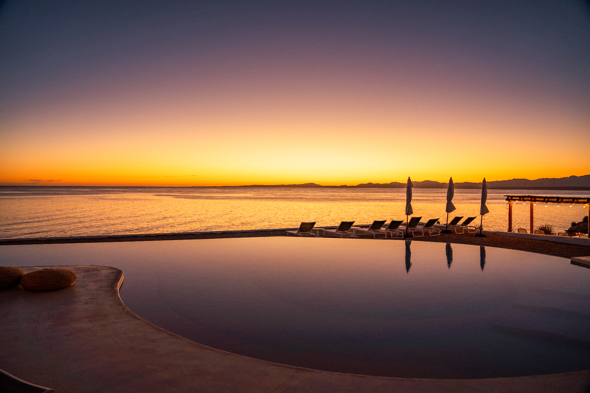 Dusk — pool as mirror